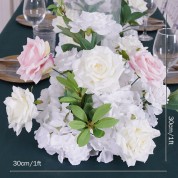 Flowers In A Vase On A Table